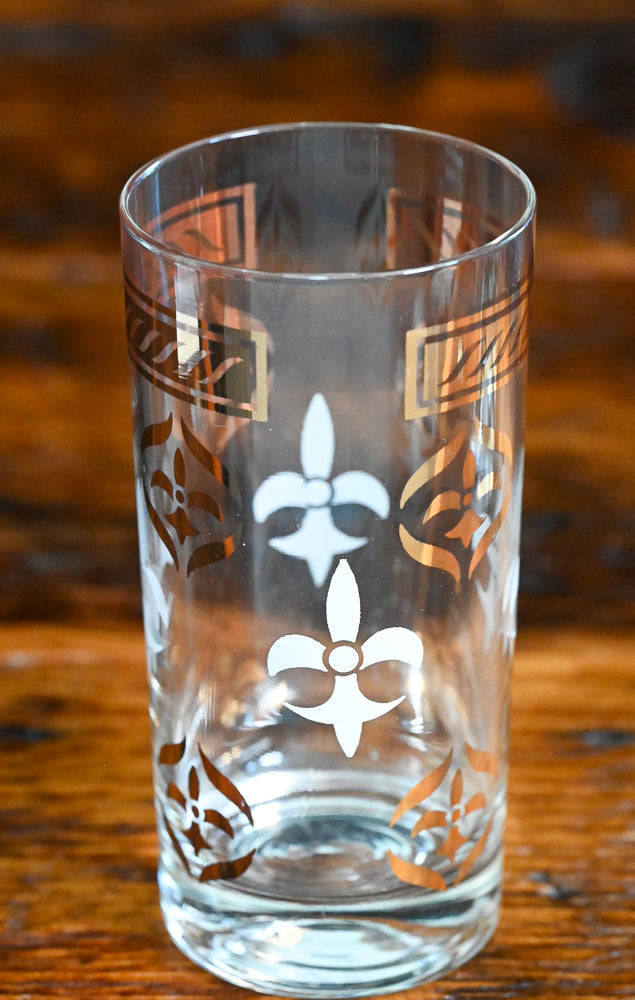 white and gold Fleur de lis print tumblers