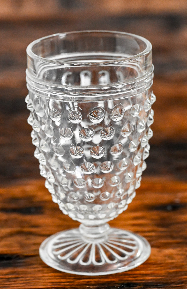 clear hobnail footed goblet
