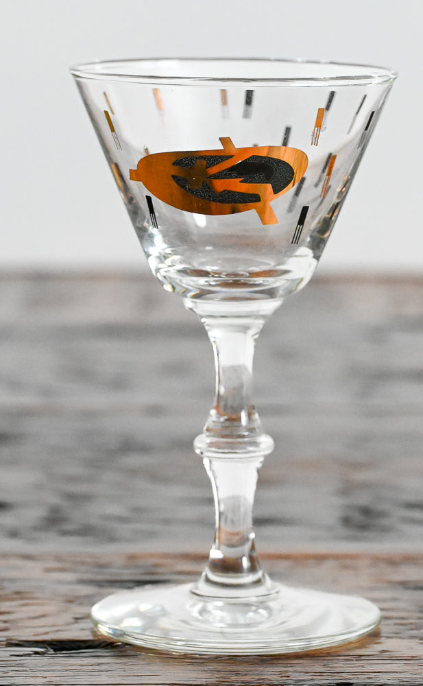 black and gold logo cordial glasses