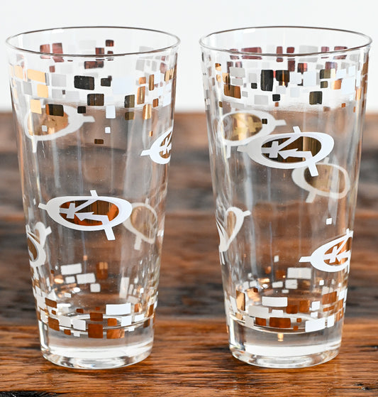 white and gold logo highball glasses