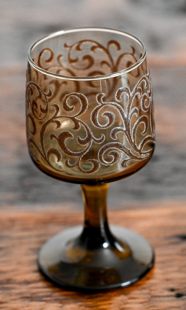 brown scrolls on brown glass Libbey goblet