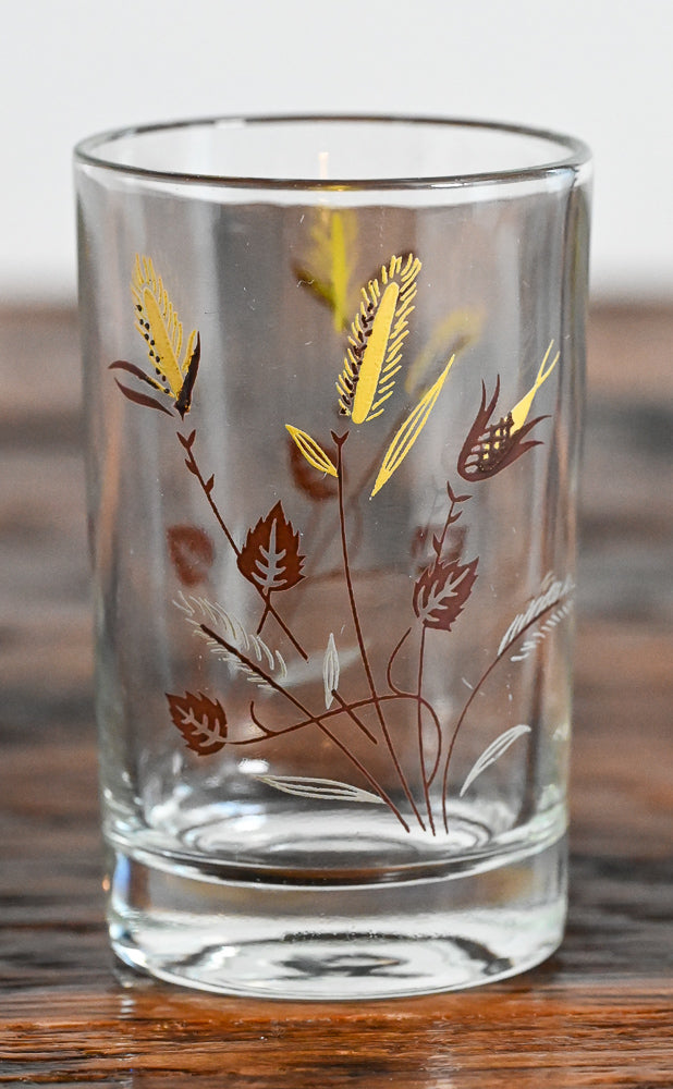 brown and yellow wheat pattern juice glass