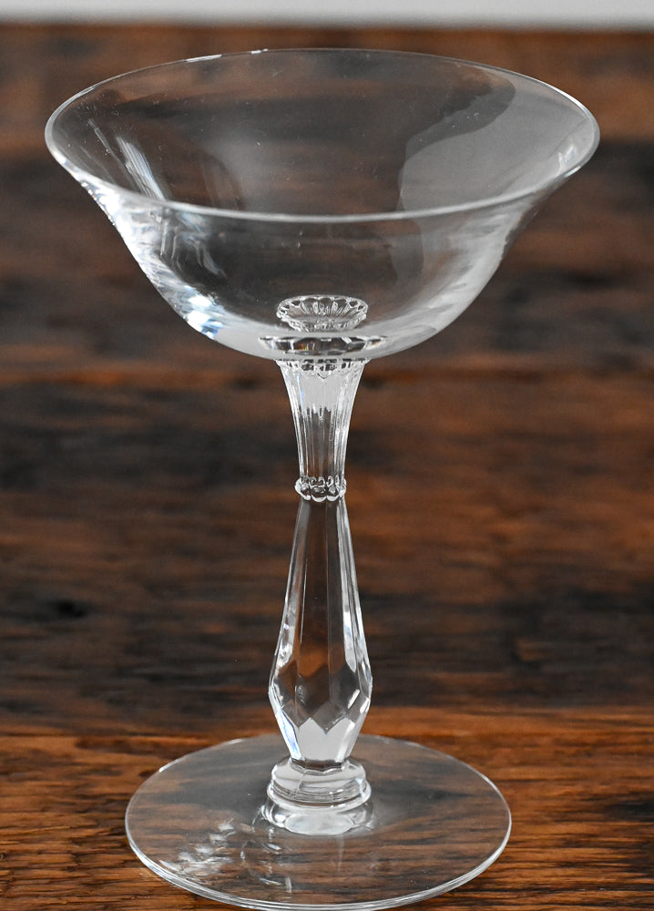 clear cocktail coupe with faceted stem