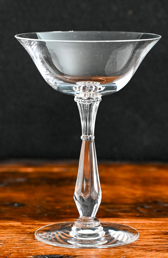 clear cocktail coupe with faceted stem