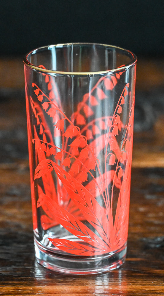 red lily of the valley tumbler with gold rim