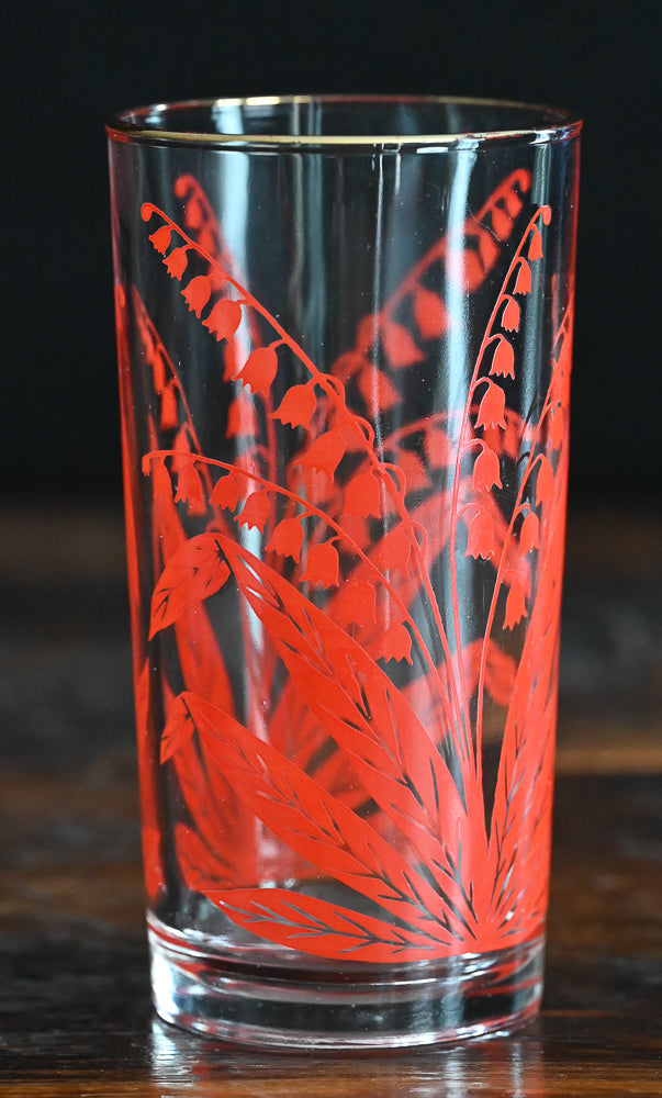 red lily of the valley tumbler with gold rim