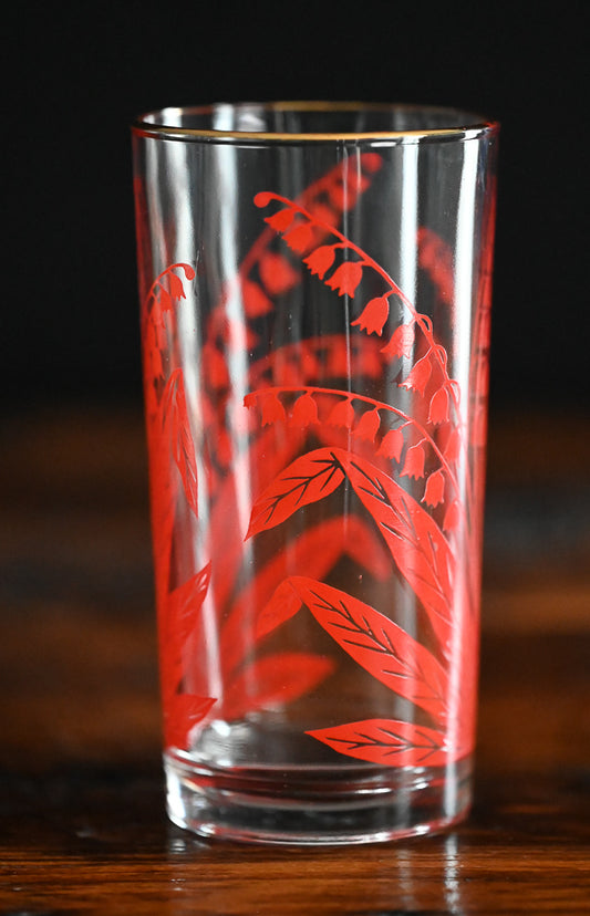 red lily of the valley tumbler with gold rim