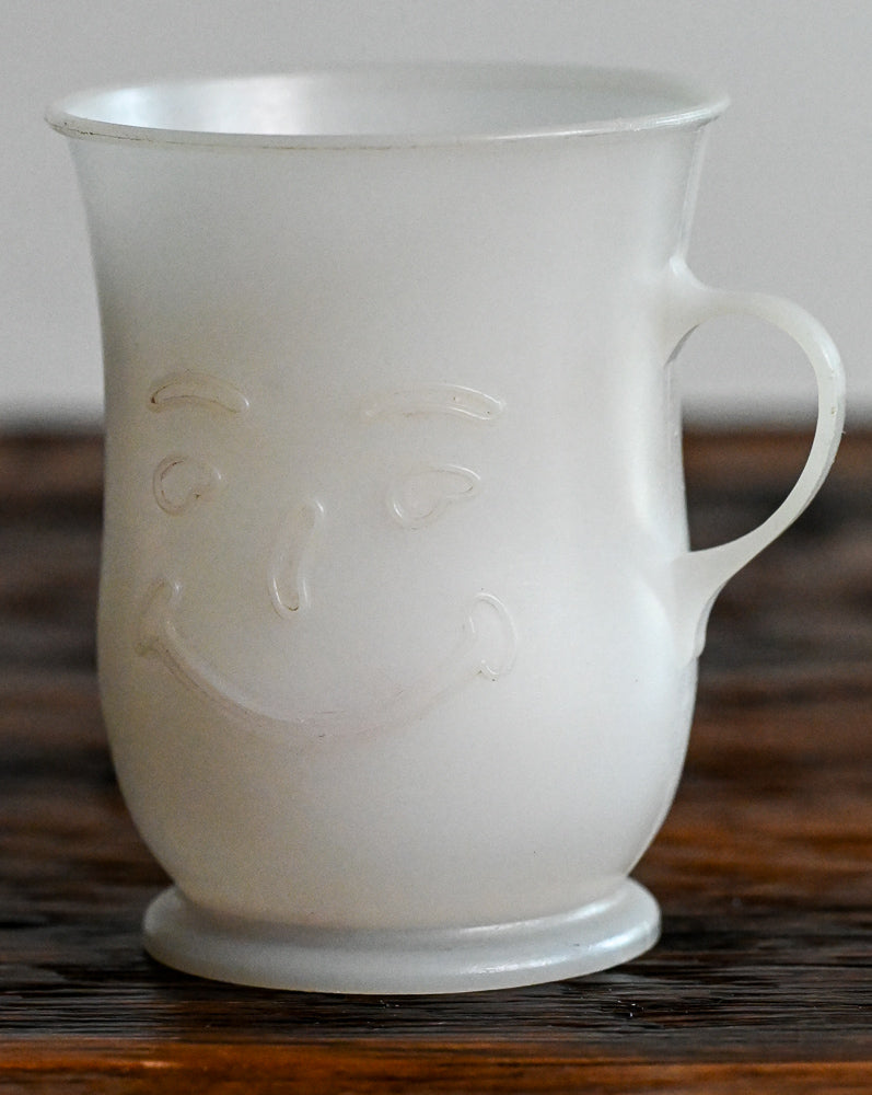 White plastic cup with handle - Kool-Aid Man face