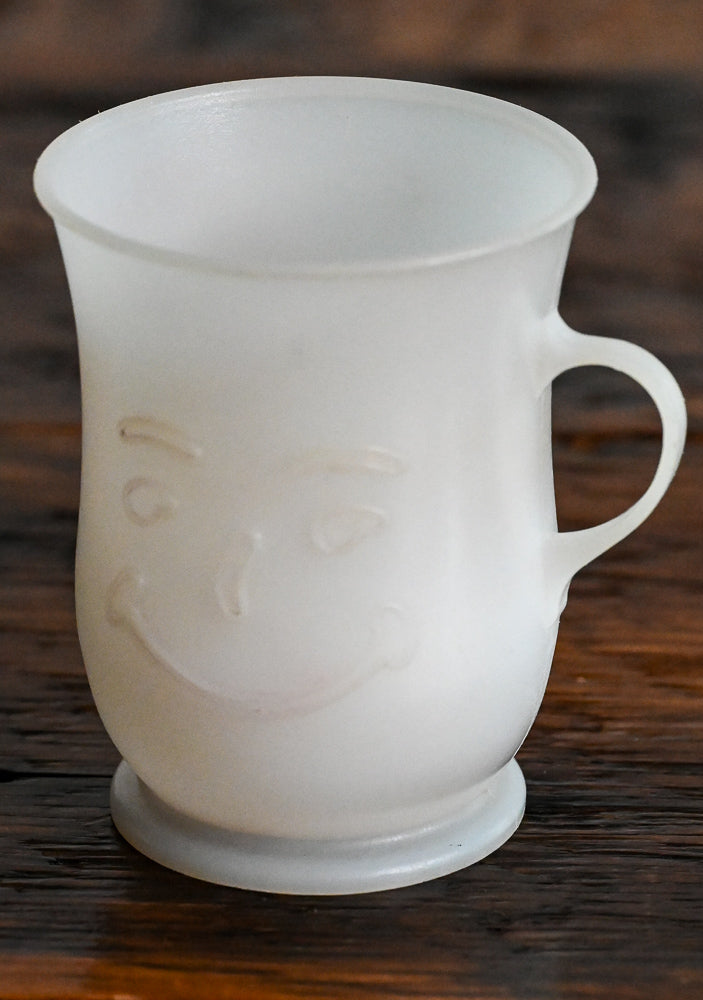White plastic cup with handle - Kool-Aid Man face
