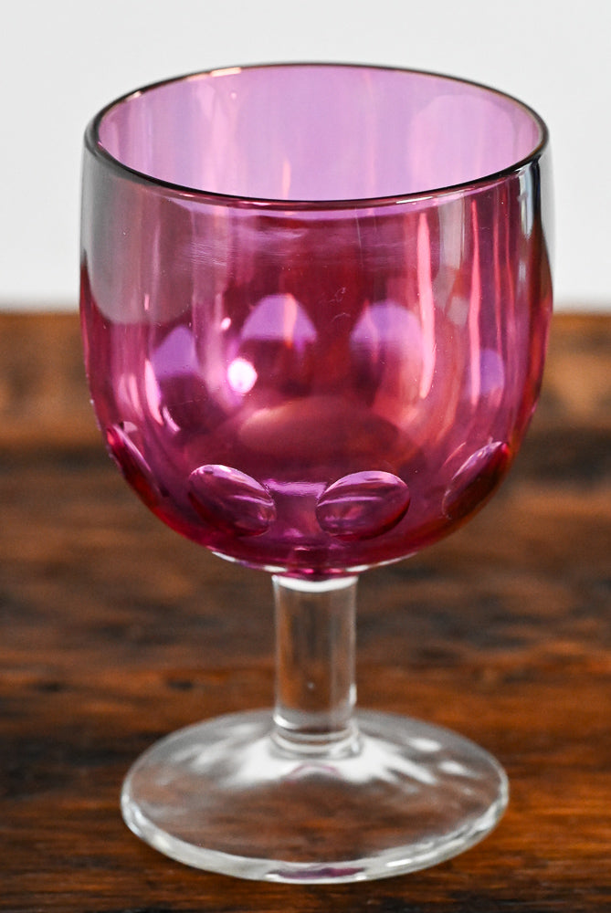 Bartlett Collins pink glass goblet, clear stem and foot