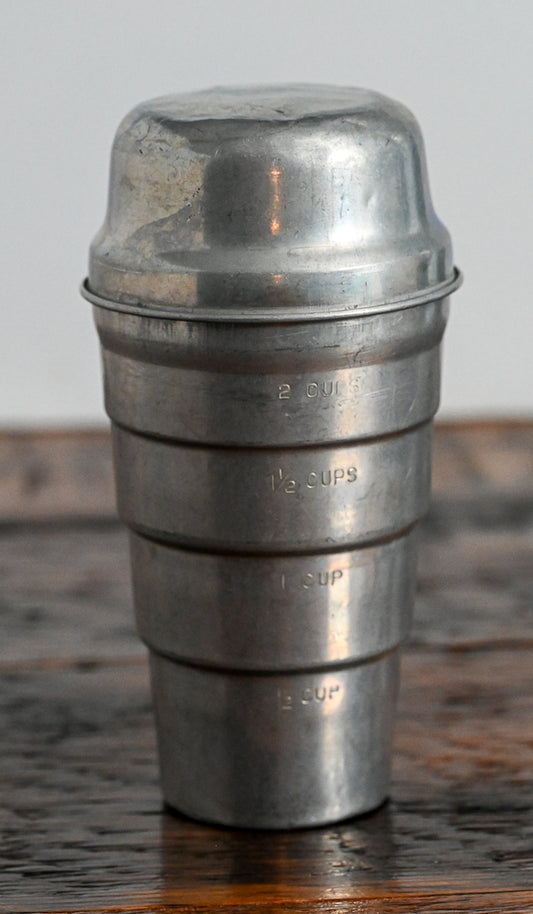 aluminum measuring cup with lid