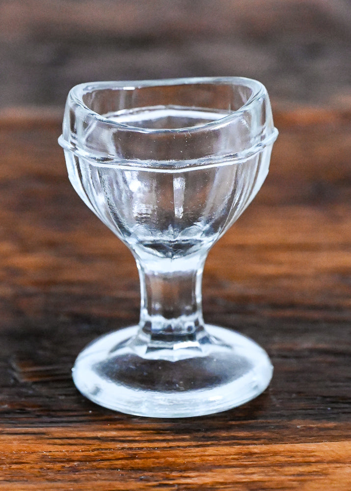 clear glass eyewash cup