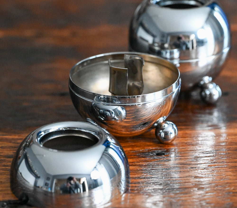 silver 3 footed orb candlestick holders