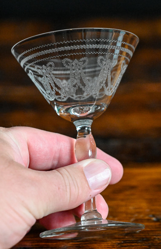 bow etched cocktail coupes