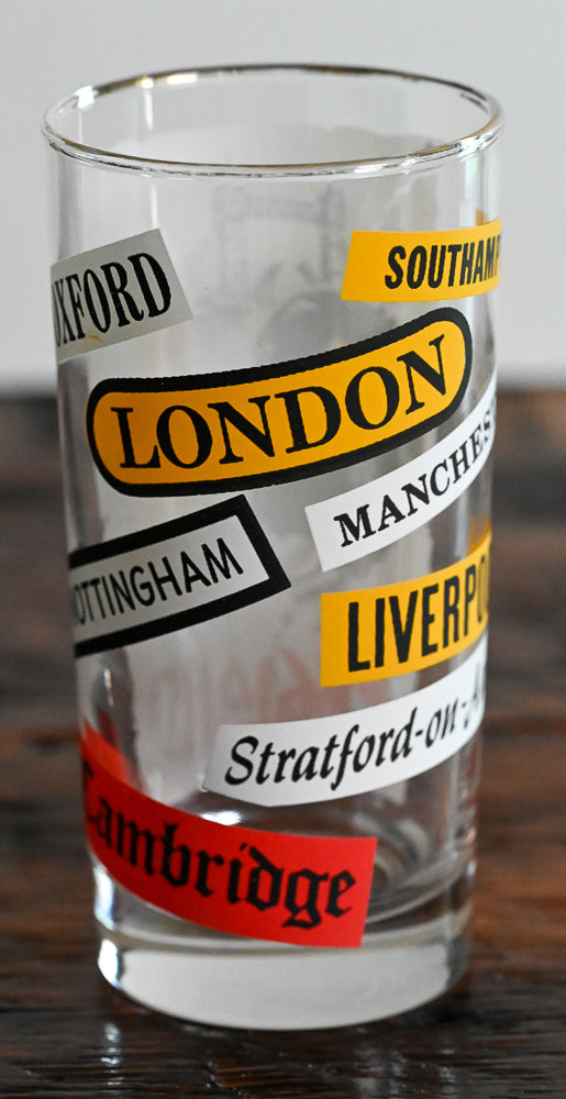 england cities written on highball glass