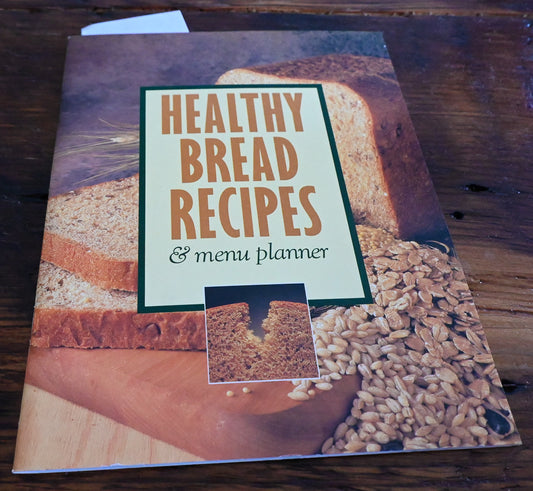 cover of Healthy Bread Recipes booklet with bread and wheat
