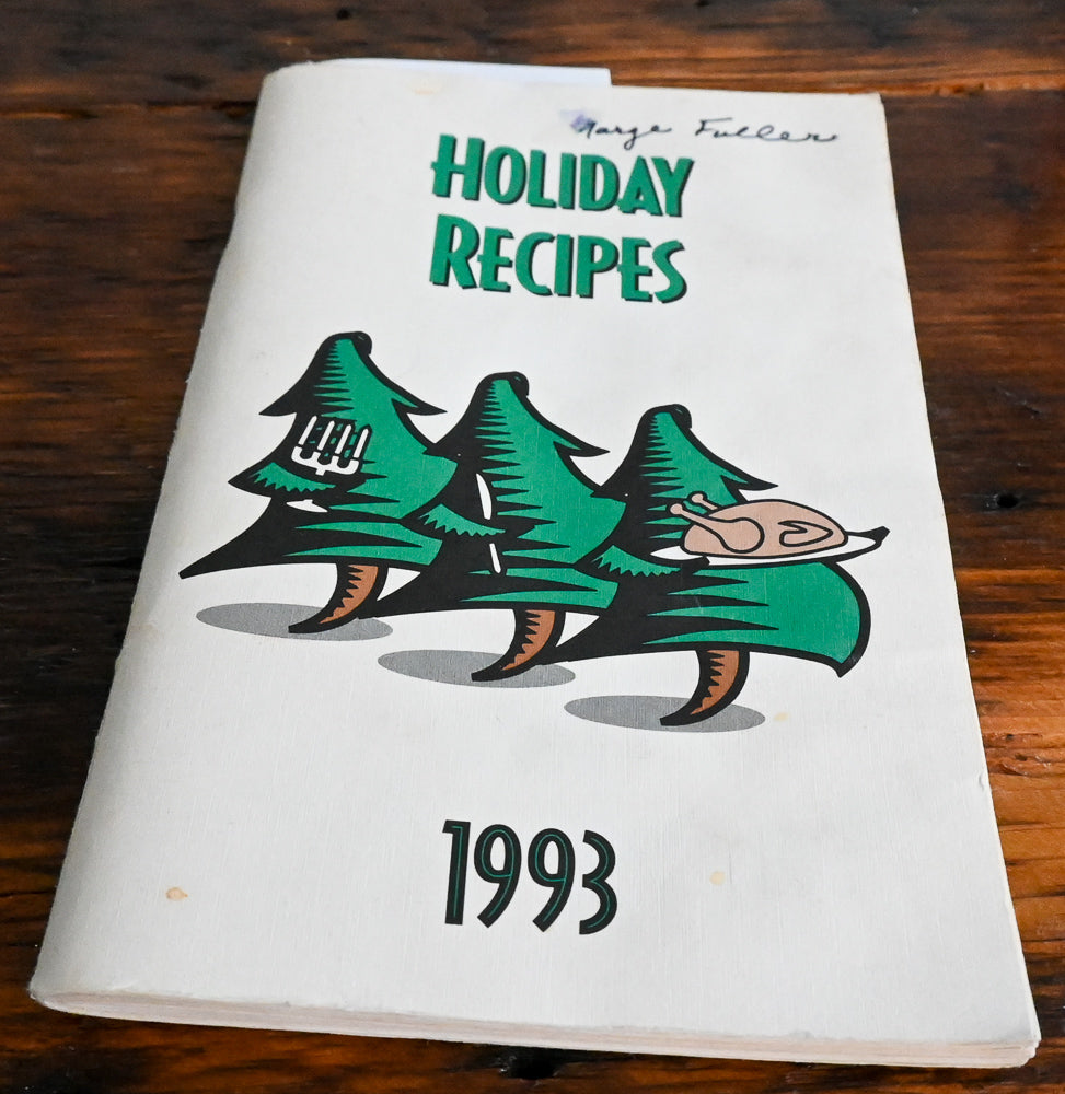 cooking pine trees on cover of Holiday Recipes cookbook