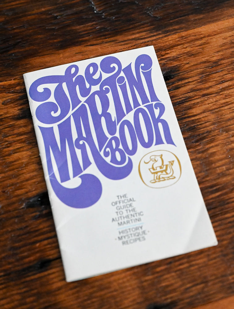 recipe pamphlet with purple writing "The Martini Book"