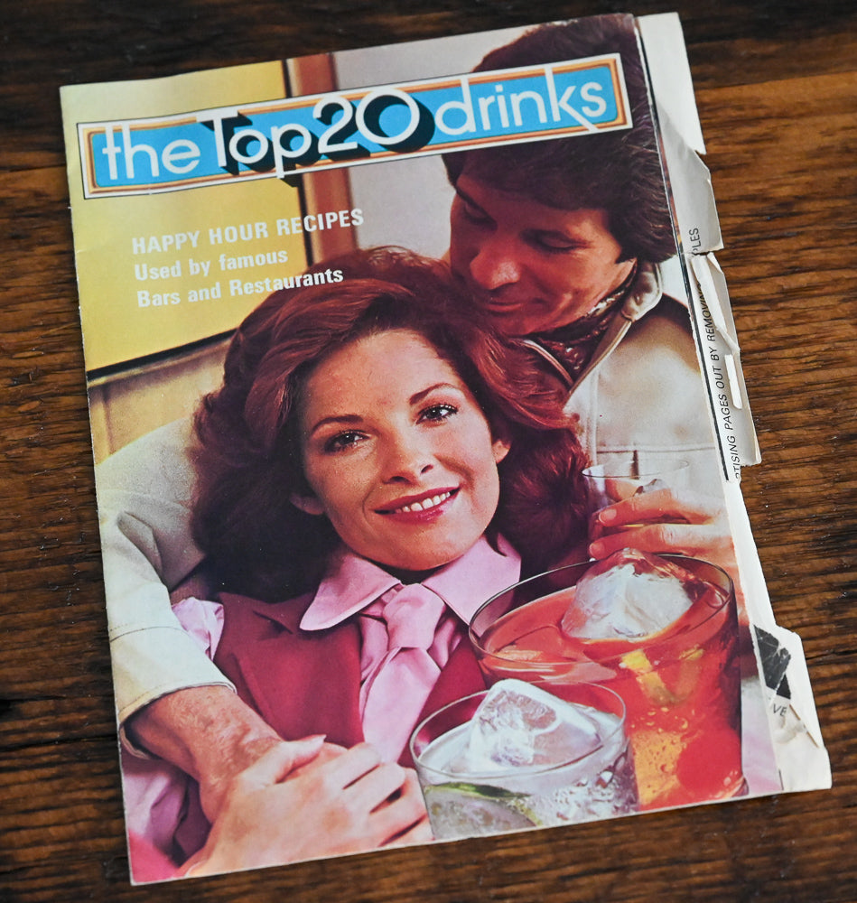 cover of Southern Comfort Top 20 Drinks booklet with man and woman and cocktails