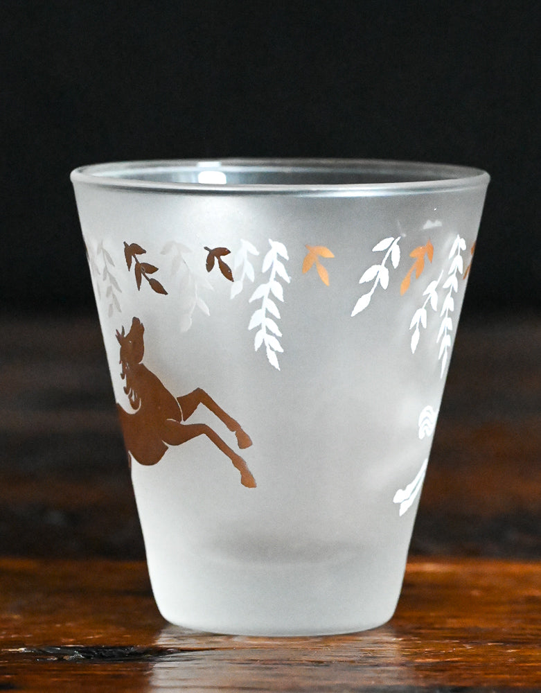 White and gold horses and leaves on frosted lowball glasses